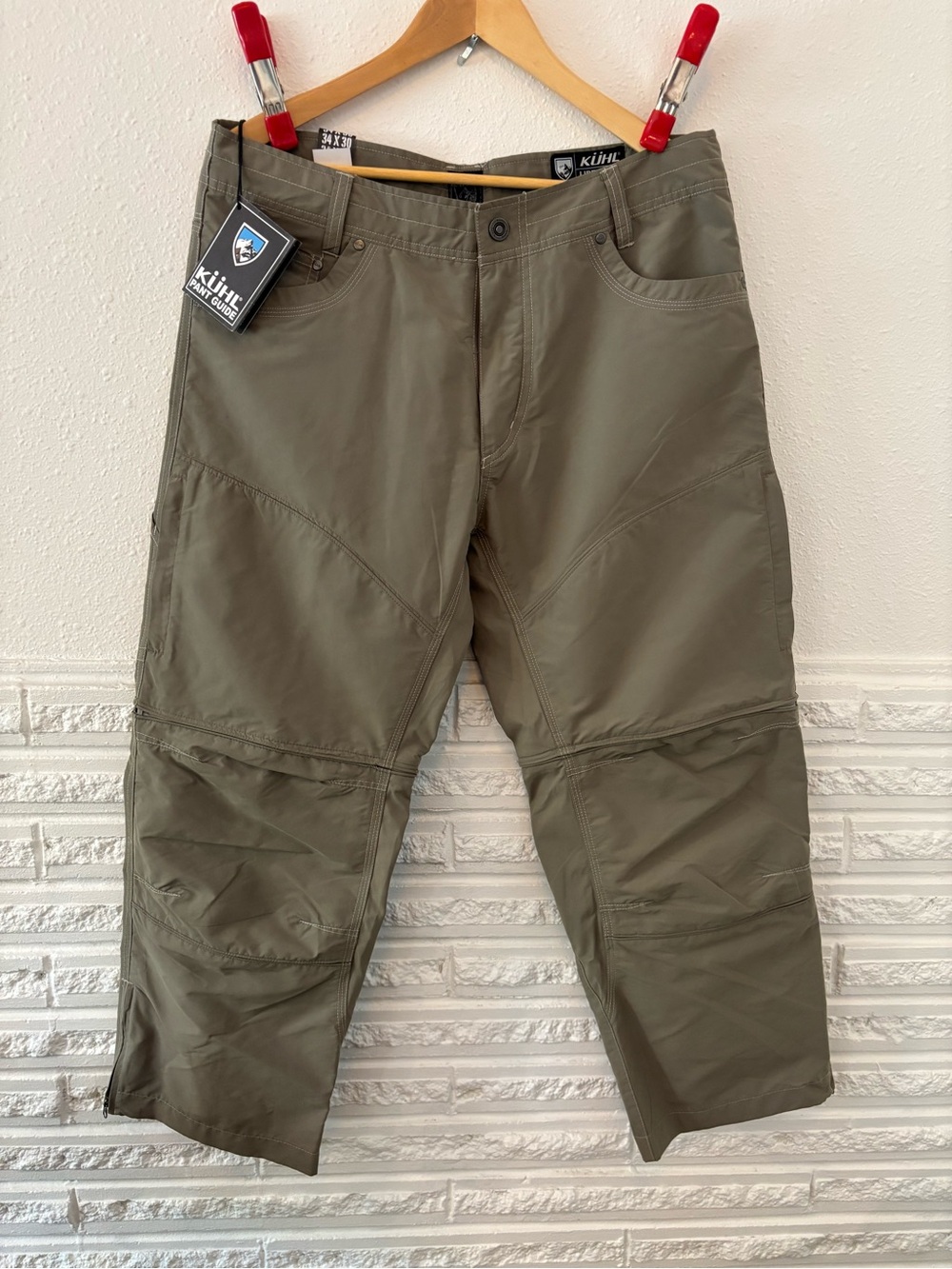 Kuhl, men’s pants, new with tags, waist 34 inch, *inseam 26 inch. See pictures